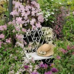 hat-on-a-chair-in-floral-marquee