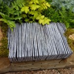 On-edge slates changed the texture of the stone walls in the Yorkshire garden