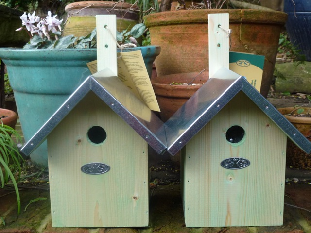 two brand new bird boxes