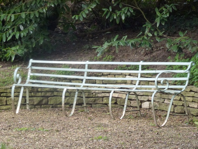 curvy iron bench at Woolbeding