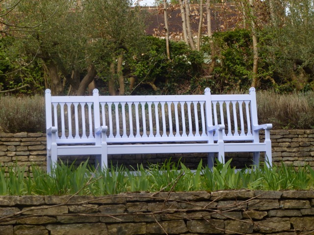 brightly painted large wooden bench