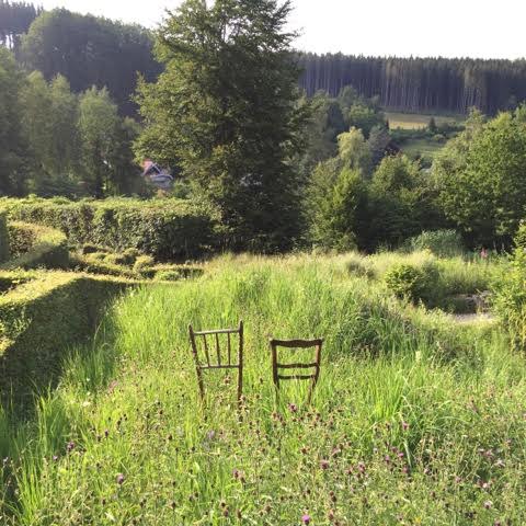 seatless chairs in a garden