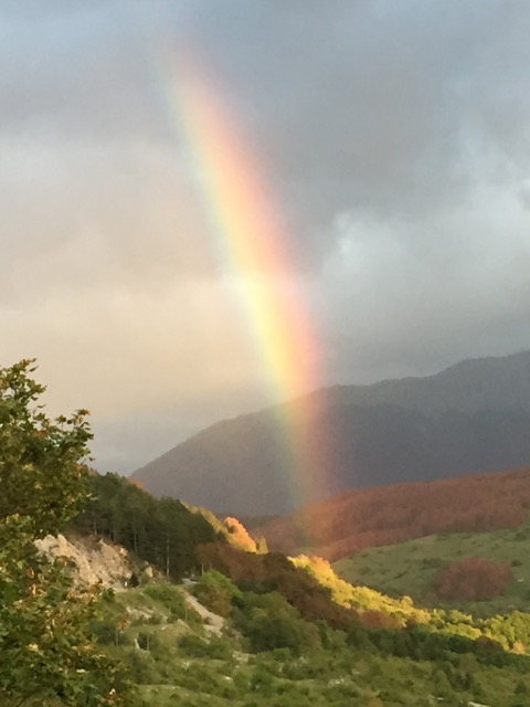rainbow over valleys